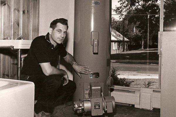 A water heater installation photographed in the 1960s